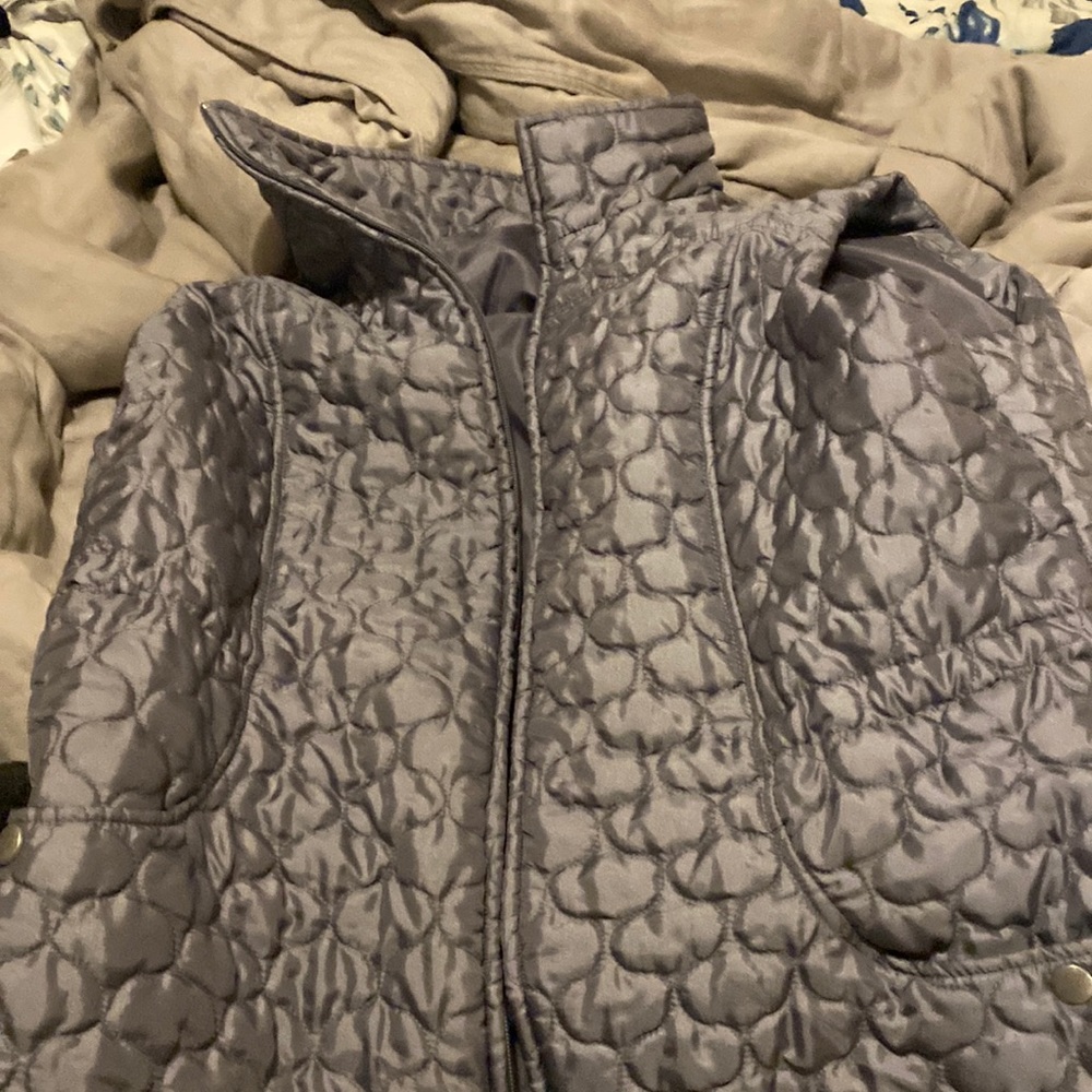 Hardly worn vest jacket. Pockets soft